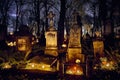 Memento mori - lights and graves on All Saints` Day in the Powazki Cemetery Polish: Cmentarz Powazkowski - is a historic