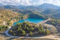 Memi lake in abandoned open pit mine in Xyliatos, Cyprus. Restoration and reforestation of old mining area Royalty Free Stock Photo