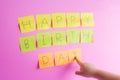 Memo note on Pink paper background, Happy Birthday