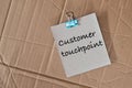 Memo note written with text CUSTOMER TOUCHPOINT