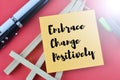 Memo note written with text EMBRACE CHANGE POSITIVELY Royalty Free Stock Photo