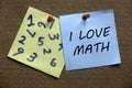 A memo notes written with numbers and I Love Math on a cork board Royalty Free Stock Photo