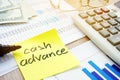 Memo stick about cash advance. Royalty Free Stock Photo