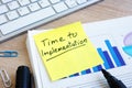 Memo stick with words Time To Implementation. Royalty Free Stock Photo