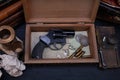 Memorabilia - old vintage revolver gun with ammunitions in wooden box for letters