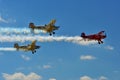 Memorial Airshow, Bucker Jungmeister in flight, smoke effect