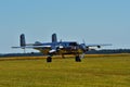 Memorial Airshow. Chrome B-25 Mitchell bomber plane from World War II in flight.