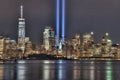 9/11 Memorial Beams with Statue of Liberty Between Them and Lower Manhattan