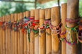 Memorial bracelet on Wooden Sticks in Cambodian Holocaust Memorial Site close to Phnom Pehn Royalty Free Stock Photo
