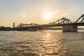 Memorial Bridge, and Phra Pok Klao Bridge with buildings and Chao Phraya River at noon. Urban city, Downtown Bangkok, Thailand