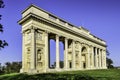 Memorial building of the colonnade at Reistna in the summer on the green grass. Historic monument with a series of columns, South