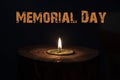 Memorial day, inscription on black background and candle Royalty Free Stock Photo