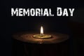 Memorial day, inscription on black background and candle Royalty Free Stock Photo