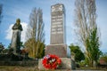 Memorial and Headstones of fallen soldiers in graveyard