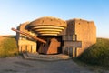 Gun emplacement at Omaha Beach. Bomb shelter with german long-range artillery gun from world war 2 in Longues-sur-Mer in Normandy.