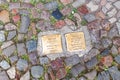 Memorial plauqes Stolperstein set into the pavement in memory of the Jews who lived on this street