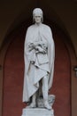 Dante`s statue under the arcades of Loggia Amulea, Padua, Italy