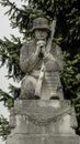 Memorial to World War I soldiers close to Lottstetten city hall, statue of praying warrior in Lottstetten, Germany.