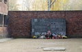 memorial at the wall at Auschwitz German Nazi concentration death camp where thousand of Polish people and Jews were executed or Royalty Free Stock Photo