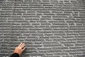 Memorial wall with names of Poles, victims of Stalinist repressions at Polish cemetery in Bykivnia near Kyiv. Ukraine