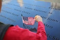 Memorial at World Trade Center Ground Zero, a small USA flag Royalty Free Stock Photo