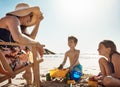 Memories made at the beach last forever. an adorable little boy and girl playing with beach toys in the sand while their Royalty Free Stock Photo