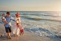 Memories made from fun. a young family enjoying a day at the beach.