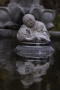 The sleeping baby Buddha statue.