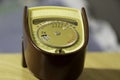 A vintage light meter for measuring old film cameras exposure. Royalty Free Stock Photo