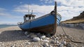 Memories revived old fishing boat on sandy seashore reflects tranquil coastal days Royalty Free Stock Photo