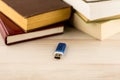 Memorization of knowledge: books and organizer are near the blue