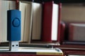 Stack books on wooden background. USB Royalty Free Stock Photo