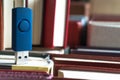 Stack books on wooden background. USB Royalty Free Stock Photo