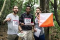 Men attending outdoor orienteering checkpoint activity