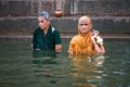 Men bathing in holy waters, Varanasi, India