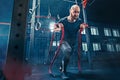 Men with battle rope battle ropes exercise in the fitness gym. CrossFit. Royalty Free Stock Photo