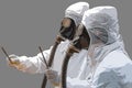 MEN IN BIOHAZARD SUITS AND GAS MASKS Royalty Free Stock Photo