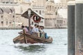 Men on board of abra water taxi across the Dubai Creek