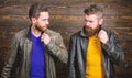 Men brutal bearded hipster posing in fashionable black leather jackets. Handsome stylish and cool. Feel confident in Royalty Free Stock Photo