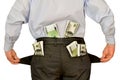 Men businessman showing empty pockets hiding behind wads of money