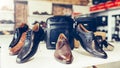 Men Classic Leather Shoes of different models and colors in the store Royalty Free Stock Photo