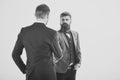 Men in classic suits, businessmen, business partners meeting, white background, . Businessmen shaking hands