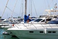 Men cleaning a yacht, Sotogrande.