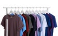 Men clothes hanging on wardrobe rack Royalty Free Stock Photo