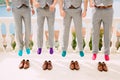 Men in colorful socks. Funny wedding photos. Wedding in Monteneg Royalty Free Stock Photo