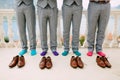 Men in colorful socks. Funny wedding photos. Wedding in Monteneg