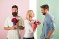 Men competitors with bouquets flowers try conquer girl. Girl smiling made her choice. Girl popular receive lot male Royalty Free Stock Photo