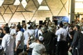 Men dance with Bible scrolls during the ceremony of Simhath Torah. Tel Aviv. Israel