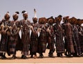 Men dancing Yaake dance and sing at Guerewol festival in InGall village, Agadez, Niger Royalty Free Stock Photo