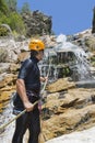 Men descending waterfall Royalty Free Stock Photo
